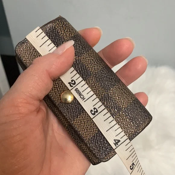 1999 authentic Louis Vuitton 4-ring key holder